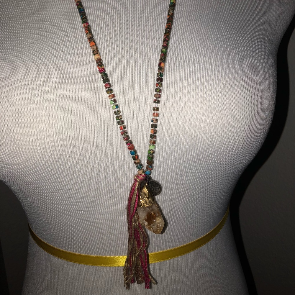 Multicolored necklace with tassel and two charms